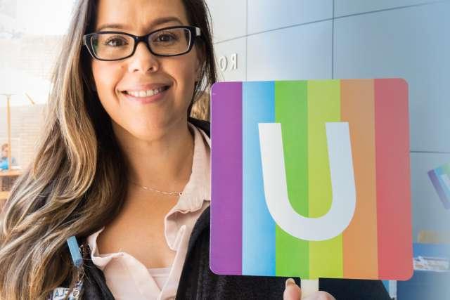 LGBTQ+ pride rainbow "U" sign